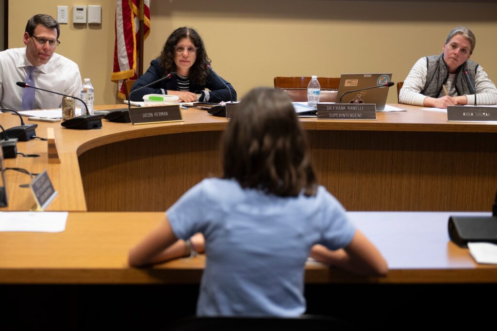 Members of the Lower Merion Board of School Directors speak