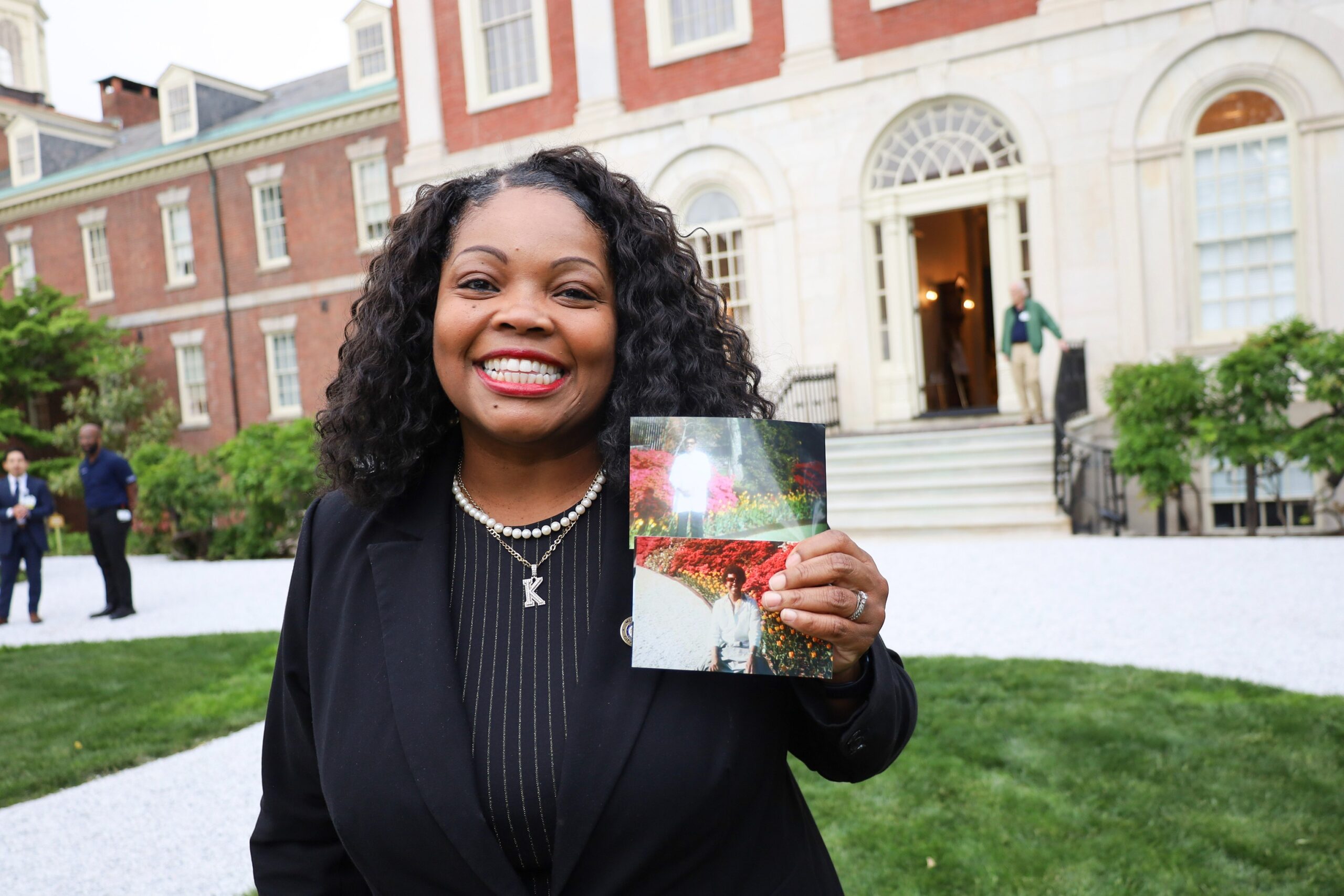 Katherine Gilmore Richardson holds photos of her parents
