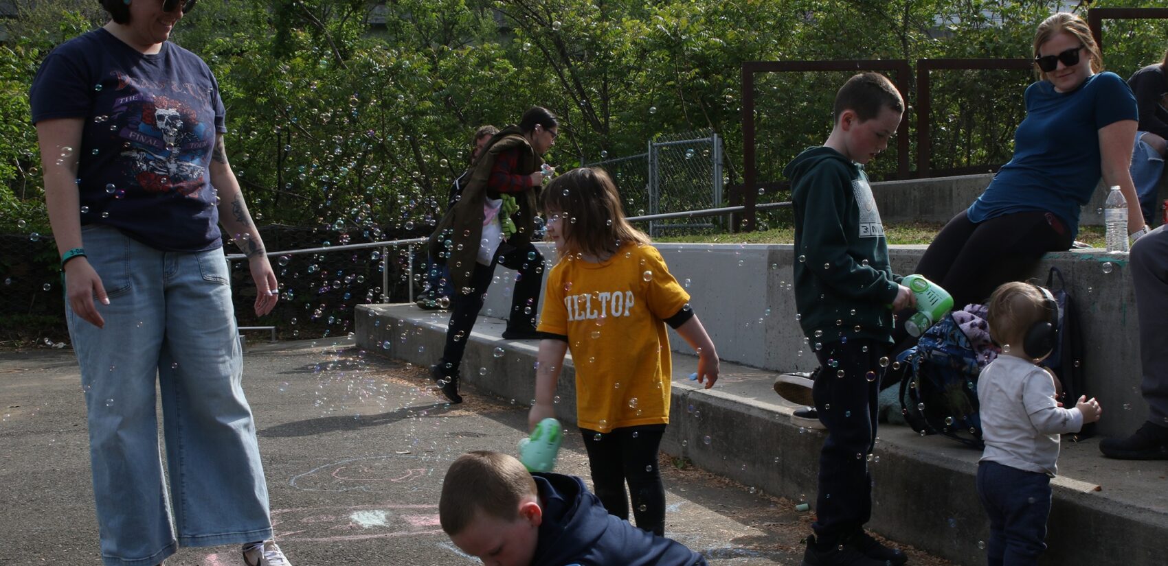 children playing with bubbles