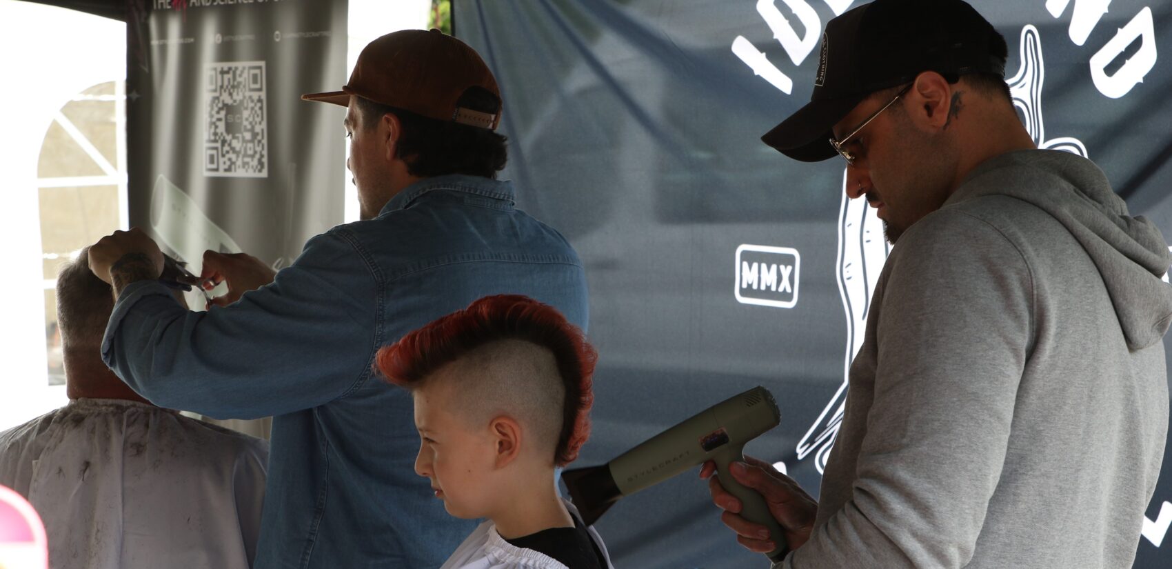 a child gets a mohawk haircut