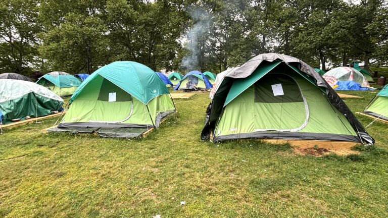 Eviction notices on tents at a Wilmington homeless encampment
