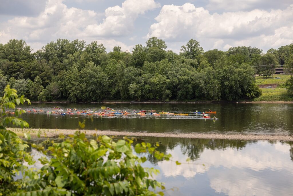 People in canoes on the river