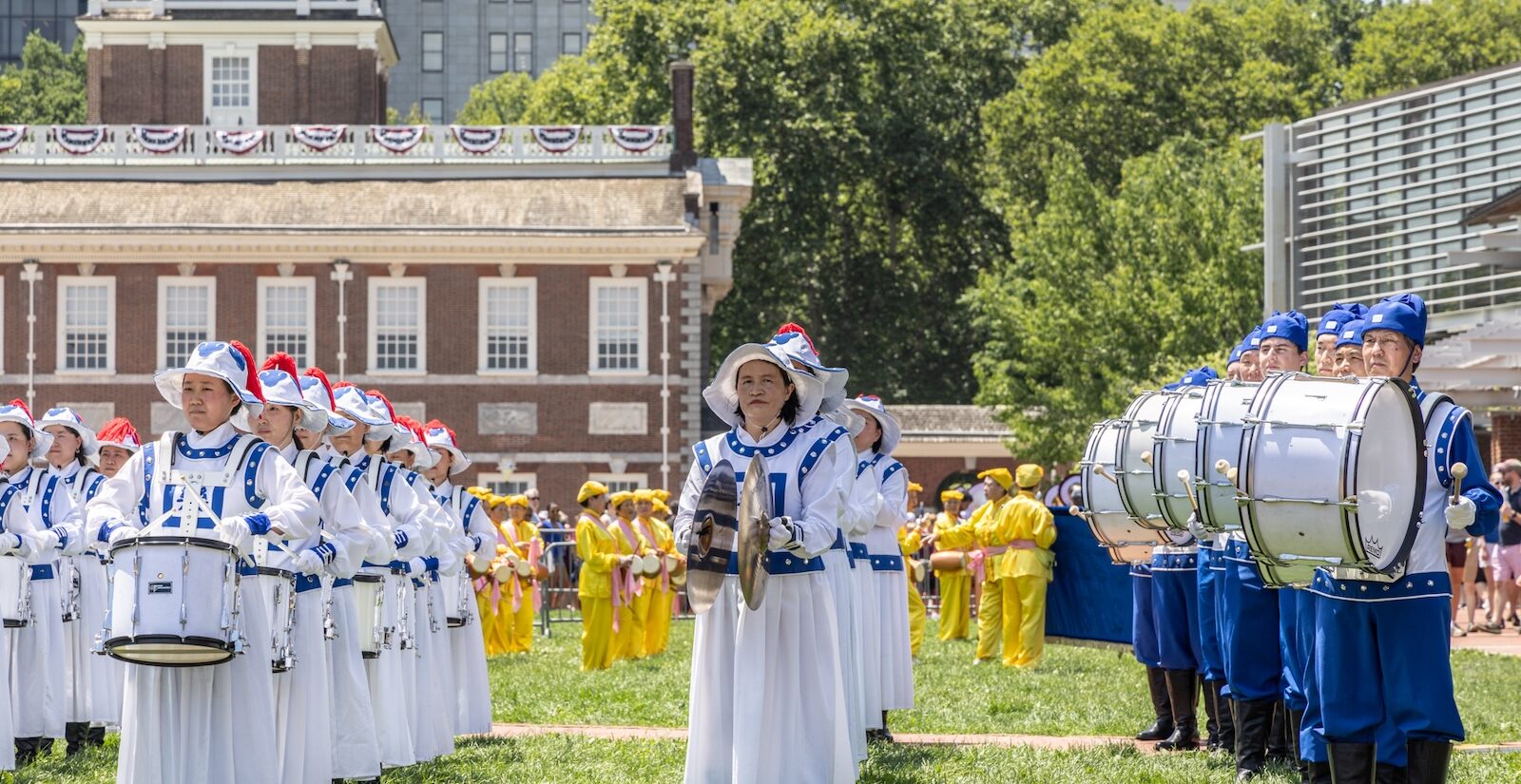 A marching band performs on Independence Mall on July 3, 2026