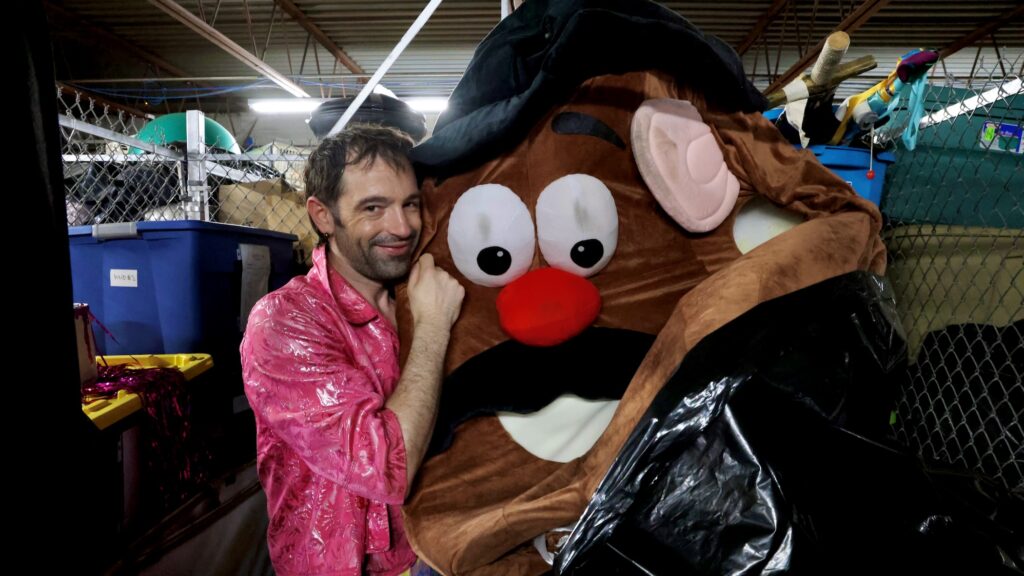 Rose Jarboe of the Bearded Ladies Cabaret cuddles a Mr. Potato Head costume