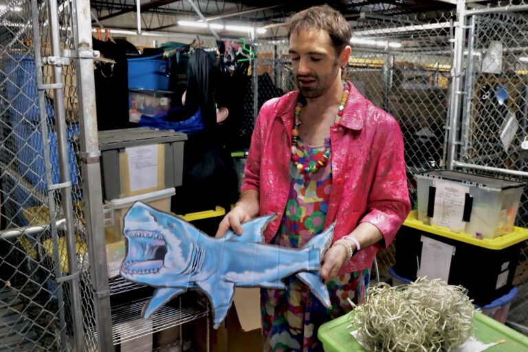 Rose Jarboe of the Bearded Ladies Cabaret sorts through old props