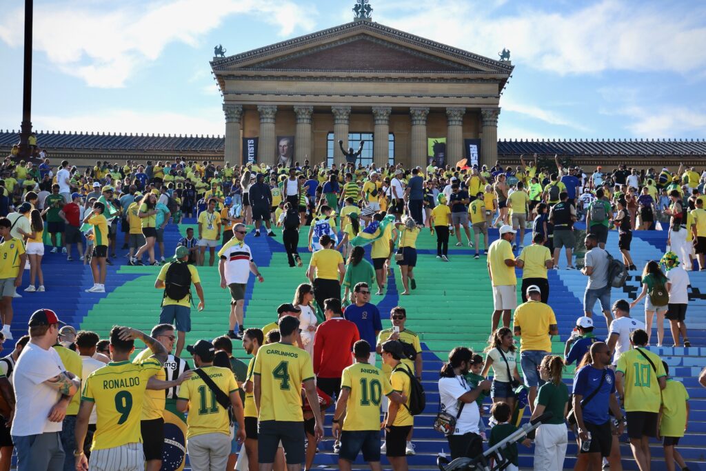 Brazilian fans rally on the steps of the Art Museum.