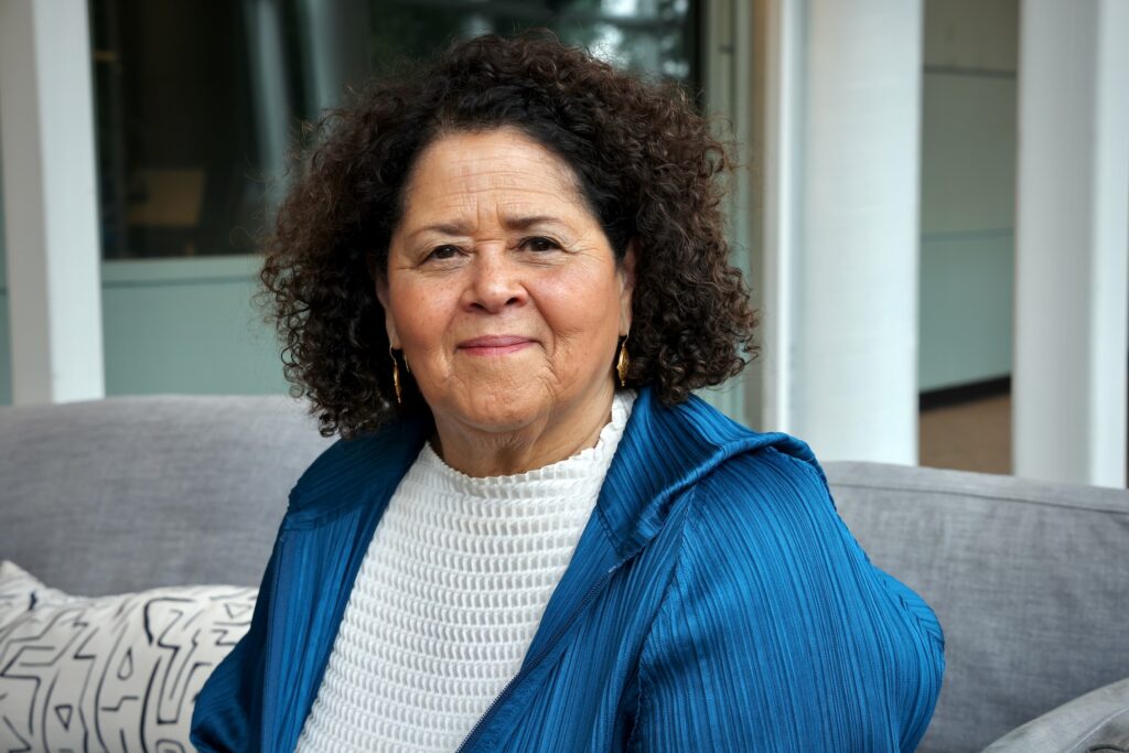 2026 06 23-e lee-anna deavere smith-philadelphia whyy-artphilly what now basil biggs project seated Anna Deavere Smith poses for a photo in WHYY studios.