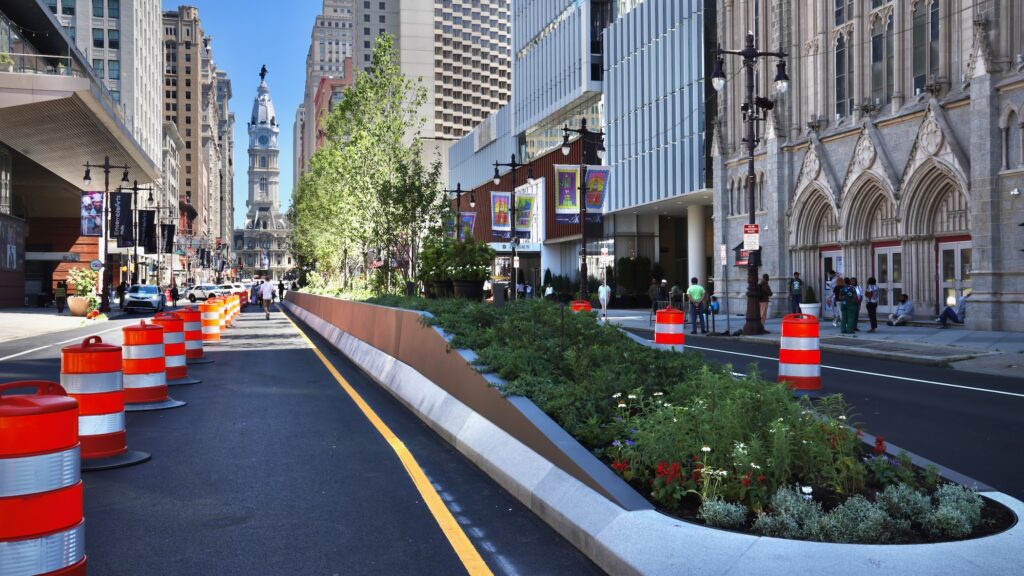 2026 06 24-e lee-philadelphia avenue of the arts-green median unveiling city hall A block of South Broad Street in Philadelphia, between Spruce and Pine streets, is seen with a raised median filled with plantings