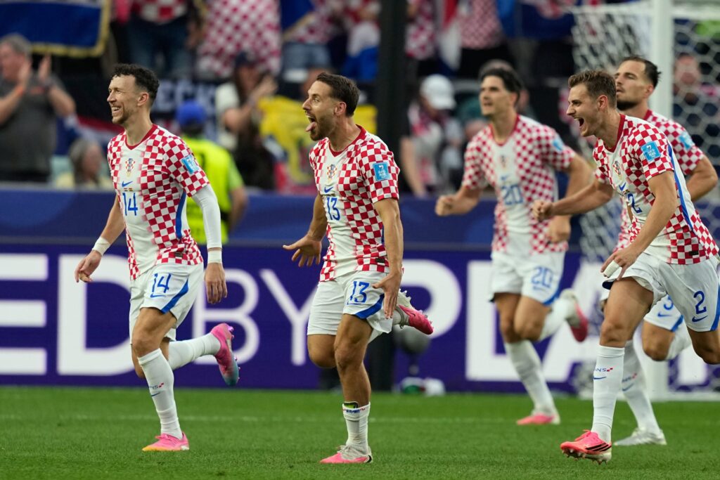 AP26178824850307-scaled Croatia's Nikola Vlasic (13) celebrates with teammates after scoring his side's second goal