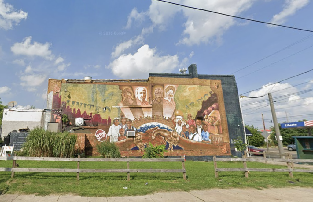 africatown-mural-bp A large mural spans 2 lots.