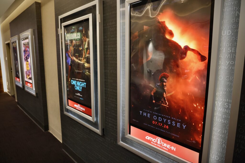 Posters at the AMC Fashion District 8 