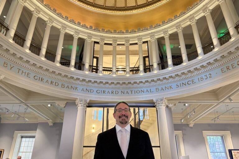 Joseph Angemi inside the bank.