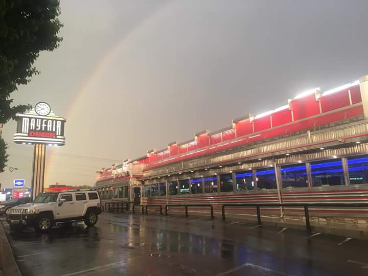 A rainbow appears over the Mayfair Diner