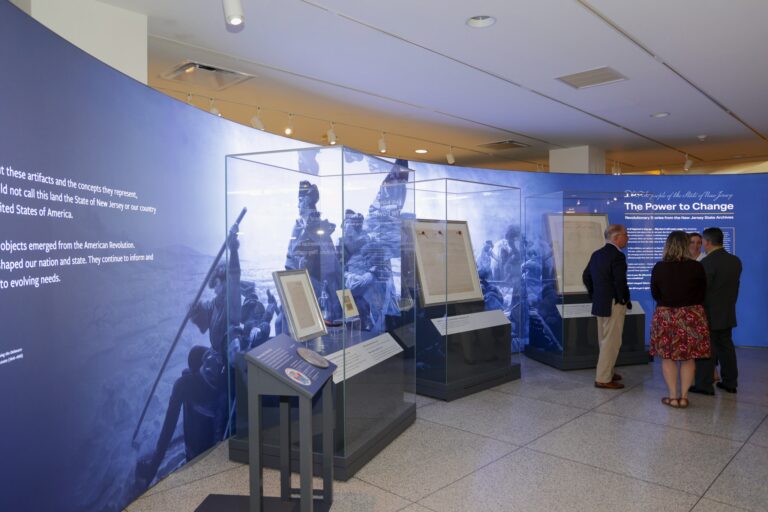 Documents and artifacts on display in the exhibit.