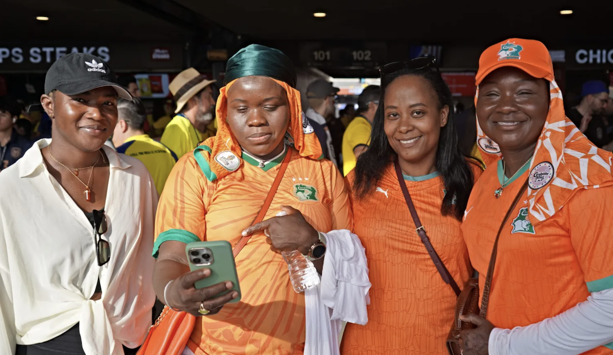 Orange-wearing fans supporting Côte d’Ivoire (from left) Koura Souma, Rokya Sylla, Mafi Soumahoro and Fanta Silla.