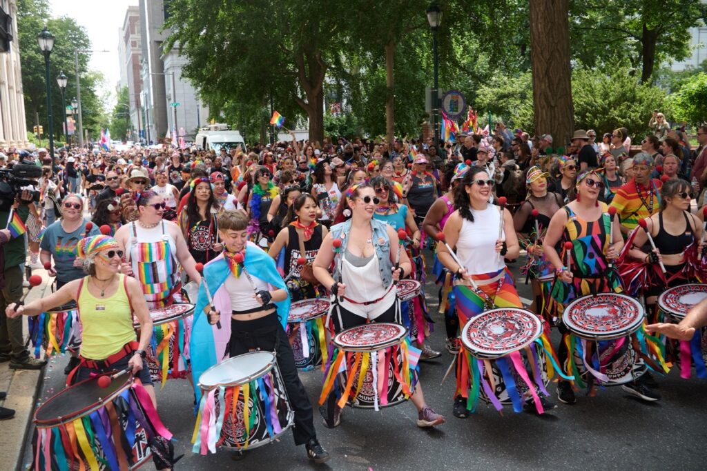 pride-parade-2025-bp-2026-06-04 Drummers lead a Pride parade