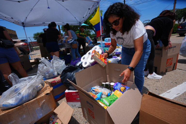 Volunteers sort supplies to send to Venezuelan earthquake victims