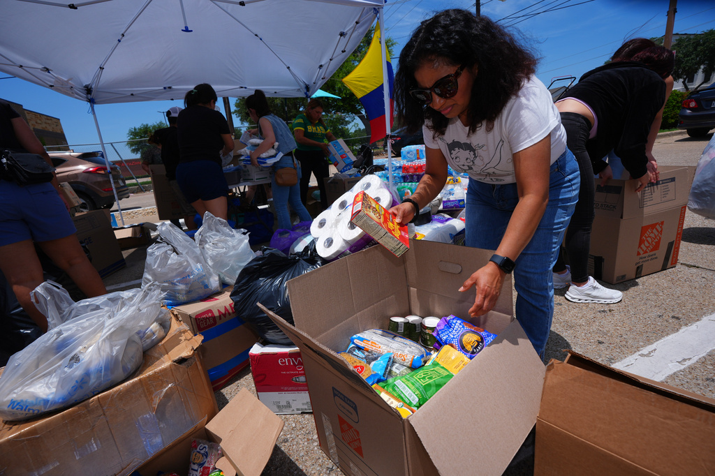 Venezuela Earthquake Aid Texas Volunteers sort supplies to send to Venezuelan earthquake victims