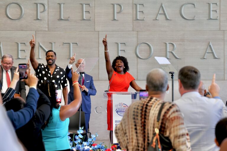 Mayor Cherelle Parker urges attendees at the National Constitution Center for the presentation of her Philadelphia Freedom Awards to raise their index fingers