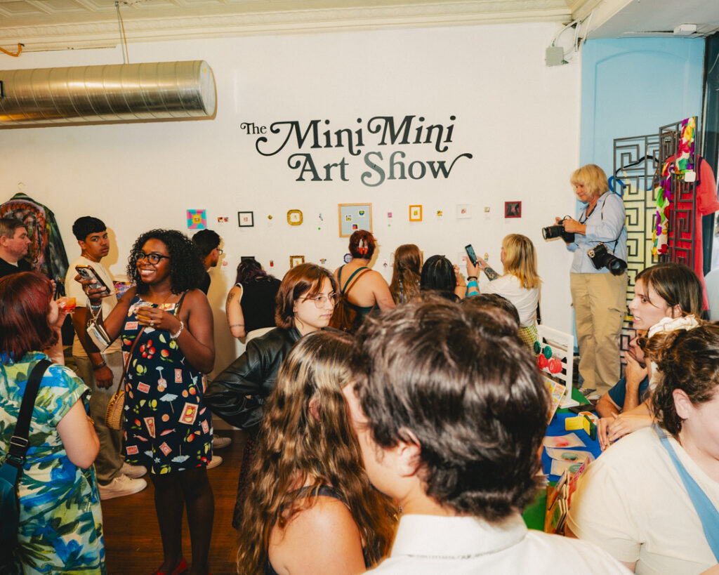 MiniMiniArtShow2_078 Attendees packed into At My House vintage shop for the Mini Mini Art Show's Friday night opening.