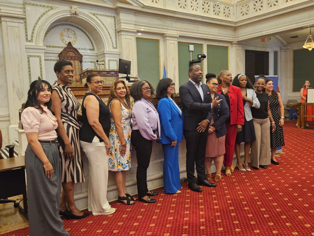 City officials and nonprofit leaders in City Hall