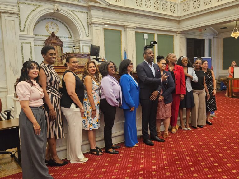 City officials and nonprofit leaders in City Hall