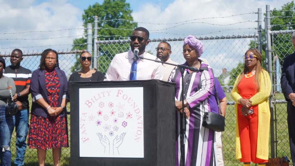 Siddiq-Kamara-Fantas-cousin-and-Tenneh-Kromah-Fantas-mother-speak-about-the-police-shooting-and-how-the-new-legislation-would-prevent-such-a-tragedy-from-occuring-again-file Siddiq Kamara speaks at a press conference