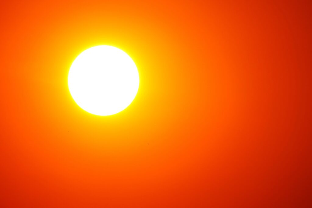 sun Blazing sun in the sky.