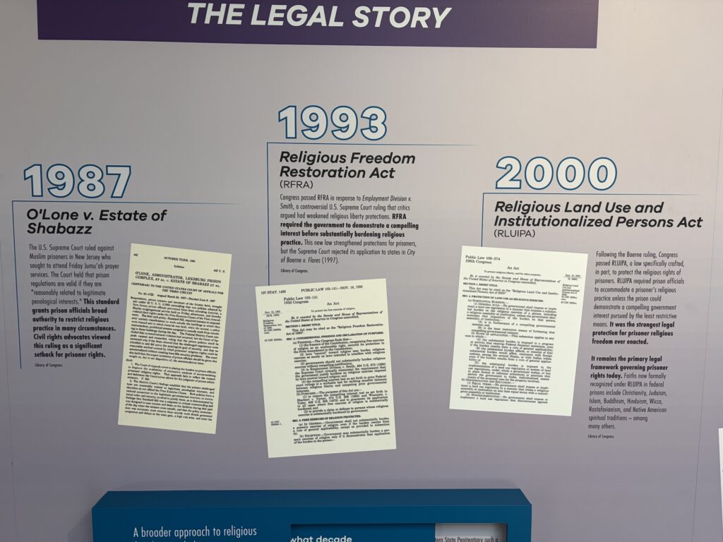 A close-up photo of a timeline hanging on the wall inside the exhibit.