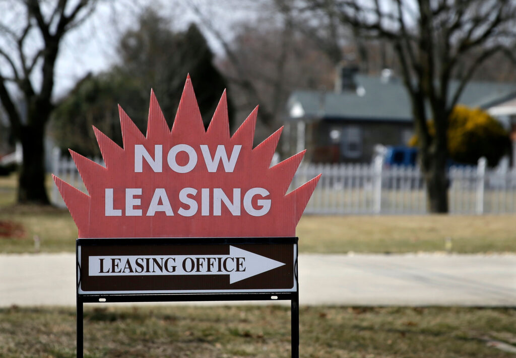 FTC Zillow Redfin a sign reads NOW LEASING and points to a leasing office