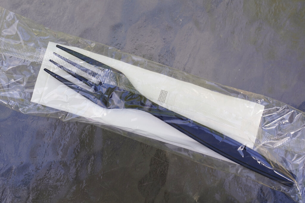 California-Plastic Pollution A plastic fork and napkin inside of a plastic wrapper