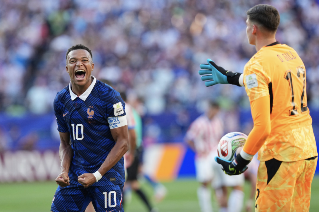 France's Kylian Mbappe (10) celebrates his team's victory at the end of the World Cup round of 16 soccer match between Paraguay and France in Philadelphia, Saturday, July 4, 2026.