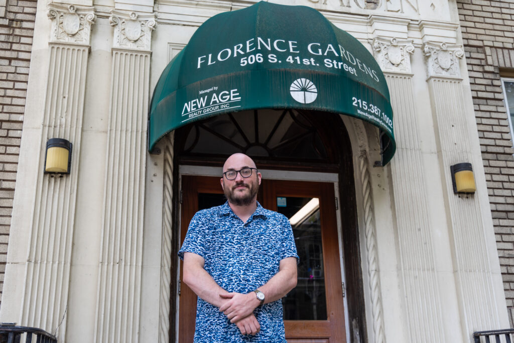 08 24 2026 k paynter florence garden resident-2 Jared Winters stands in front of Florence Gardens