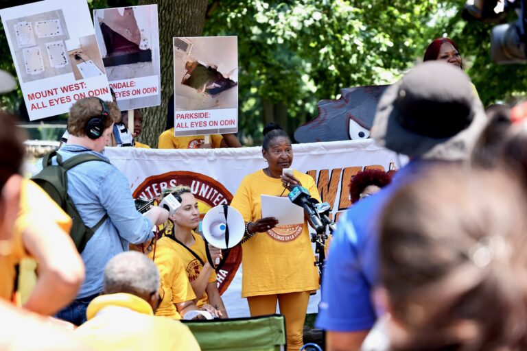 Theresa Howell speaks at a protest