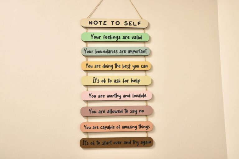a wall ornament reads NOTE TO SELF your feelings are valid, your boundaries are important, you are doing the best you can, it's ok to ask for help, you are worthy and lovable, you are allowed to say no, you are capable of amazing things, and it's ok to start over and try again