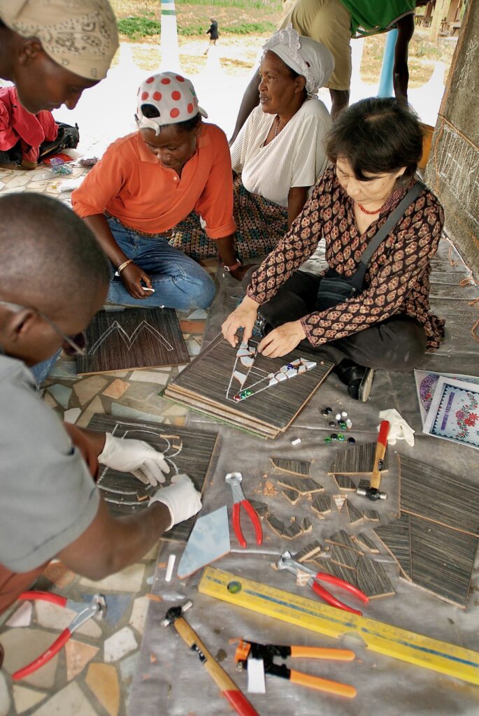Lily Yeh teaches mosaic art to Rwandans