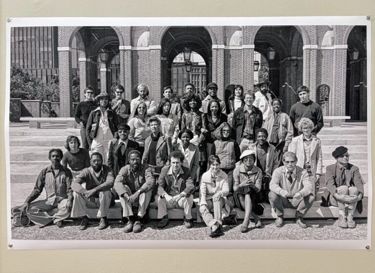 Artists pose for a picture