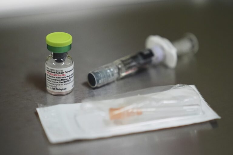 A vial of the measles, mumps and rubella (MMR) vaccine is pictured at International Community Health Services, Wednesday, Sept. 10, 2025, in Seattle. (AP Photo/Lindsey Wasson)