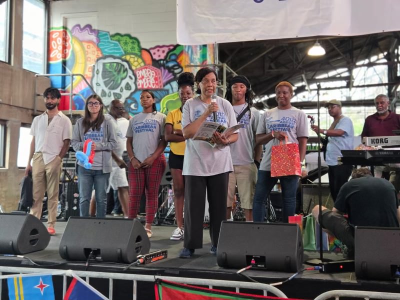 Students onstage are awarded scholarships for education and living expenses at the 40th annual Philadelphia Caribbean Festival