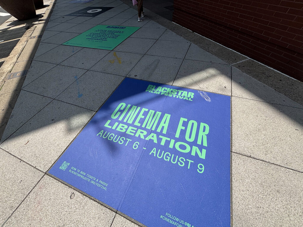 blackstar-film-festival-2026 The sidewalk outside of the Kimmel Center, with a tile promoting the BlackStar Film Festival