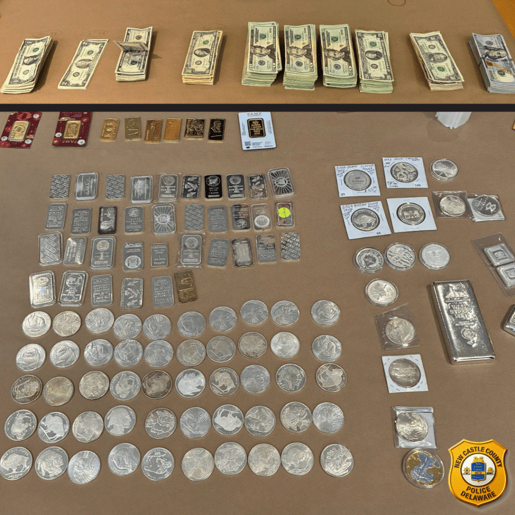Piles of cash, silver and gold bars, and coins