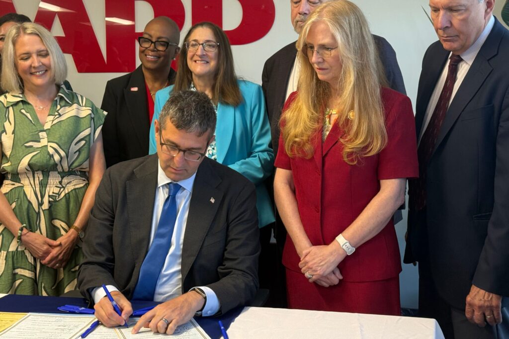 data-center-legislation-signing-matt-meyer-2026-08-26-zr-2 Matt Meyer signing legislation