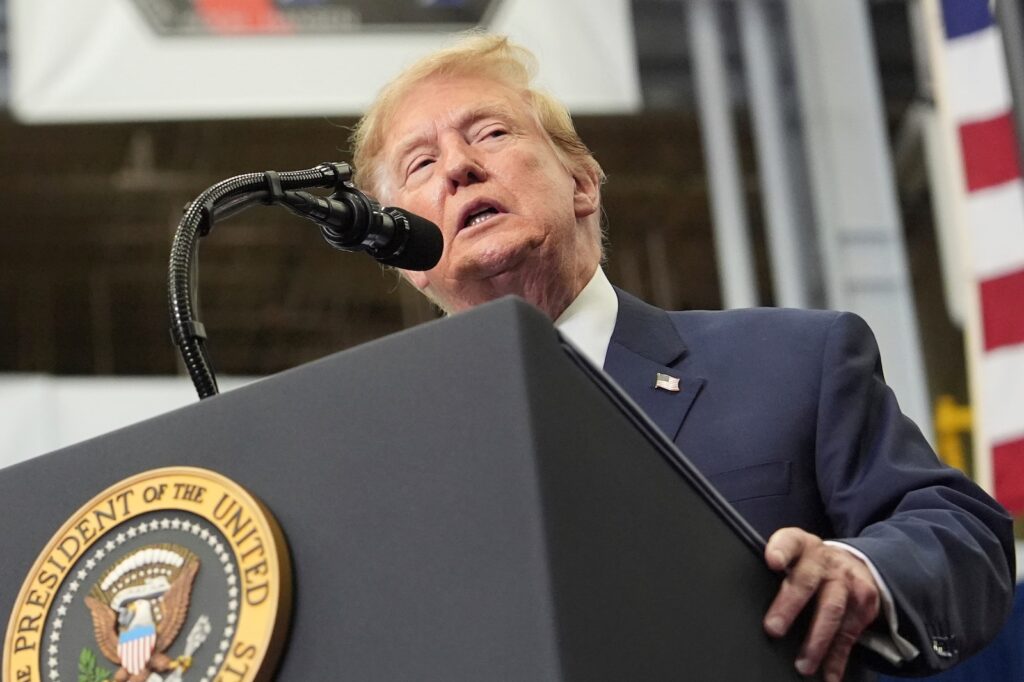 Trump President Donald Trump speaks from behind a podium Friday, Aug. 28, 2026, at Johnson Space Center in Houston.