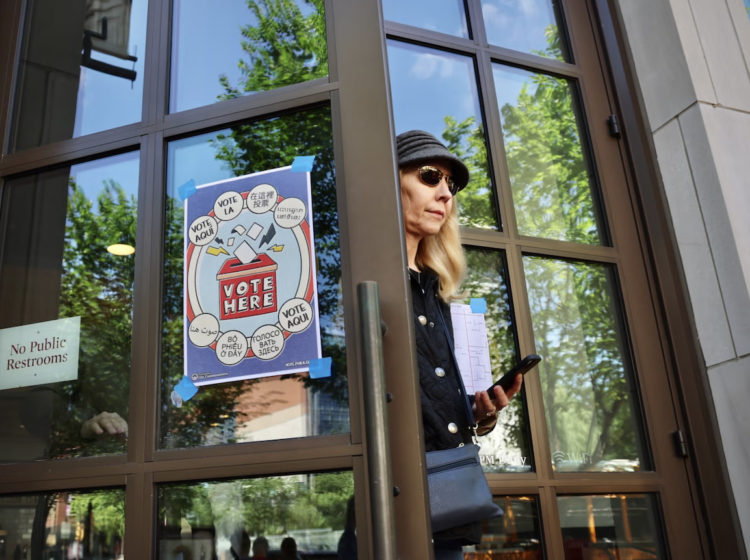 A voter leaves her polling place at the Museum of the American Revolution in Philadelphia