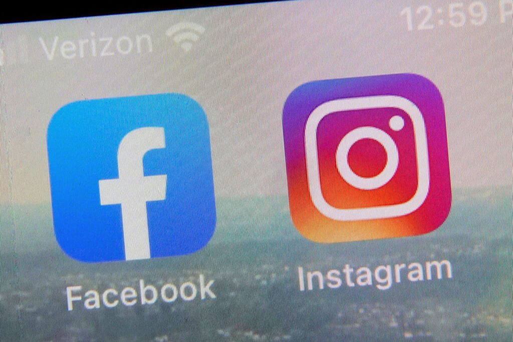 facebook-instagram-meta-file-ap-2023-10-03 A view of the mobile phone app logos for, from left, Facebook and Instagram