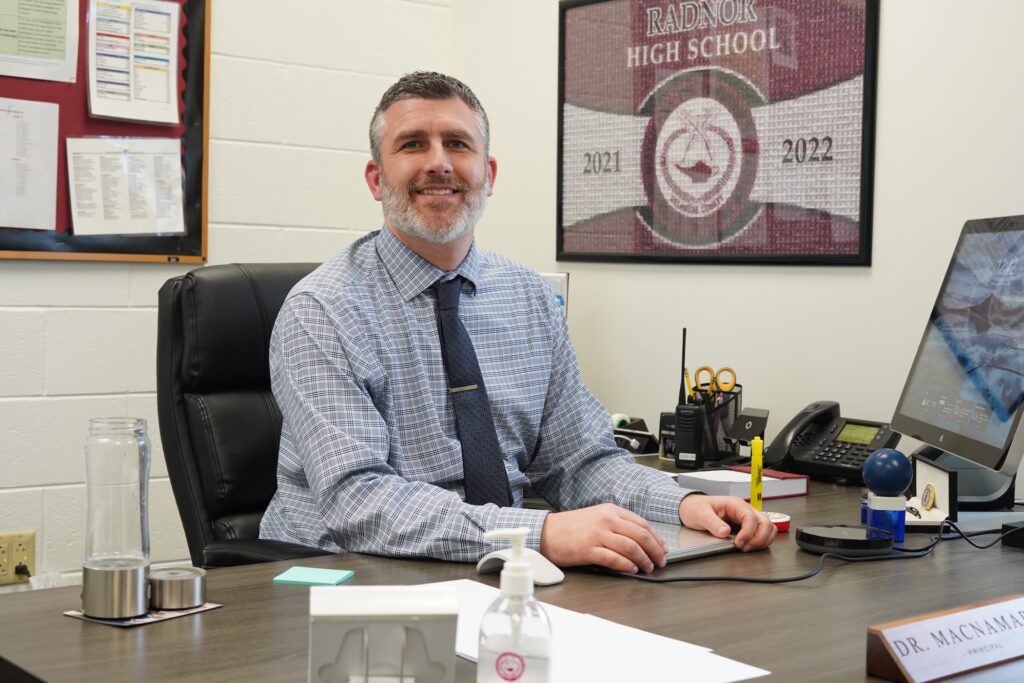 macnamara-kcooper-2026-08-25-2 Joe MacNamara is sitting at his desk inside his office at Radnor High School.