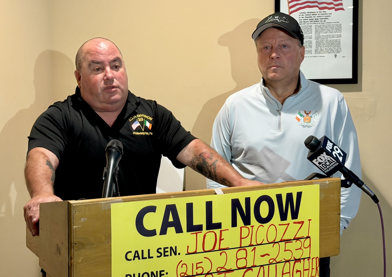 Shawn Anderson, left, and Matt McIntyre of the Ancient Order of Hibernians spoke at a Knights of Columbus hall in Northeast Philadelphia on Aug. 20, 2026.