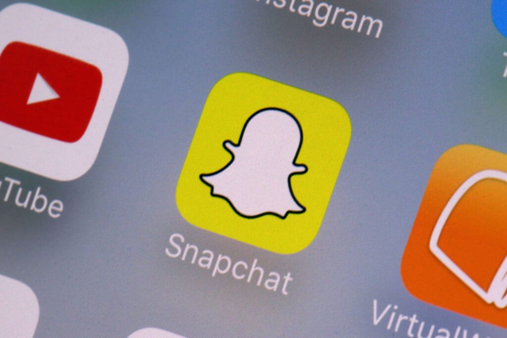 snapchat-ap-file The Snapchat app seen on a phone