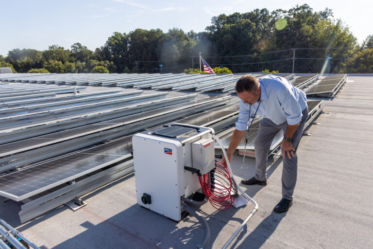 James Whitesel connecting solar panels
