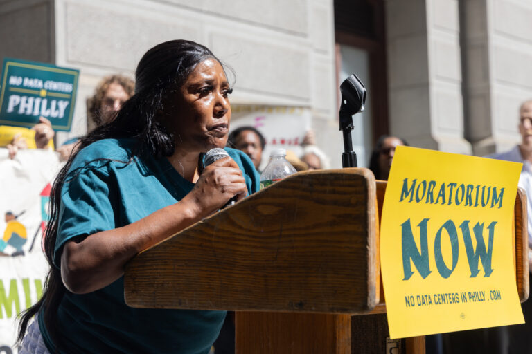Sonya Sanders speaks at a podium